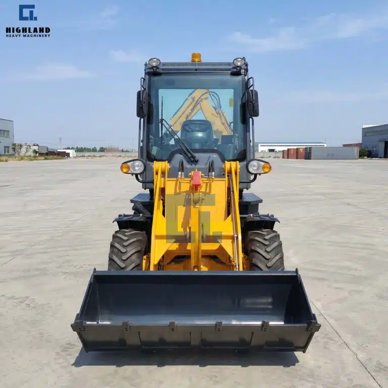 HILT 50 Mini Backhoe Loader Front Bucket Loading Soil | Highland Heavy Machinery Compact Digger Loader